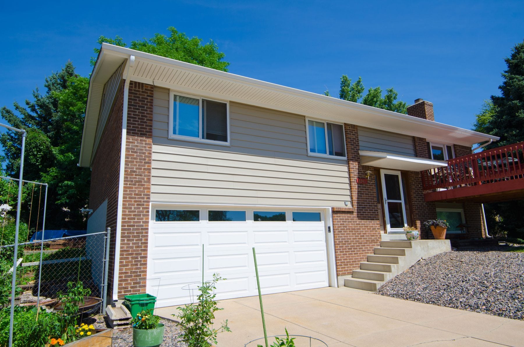 Before and after siding replacement, Conservation Construction of Texas